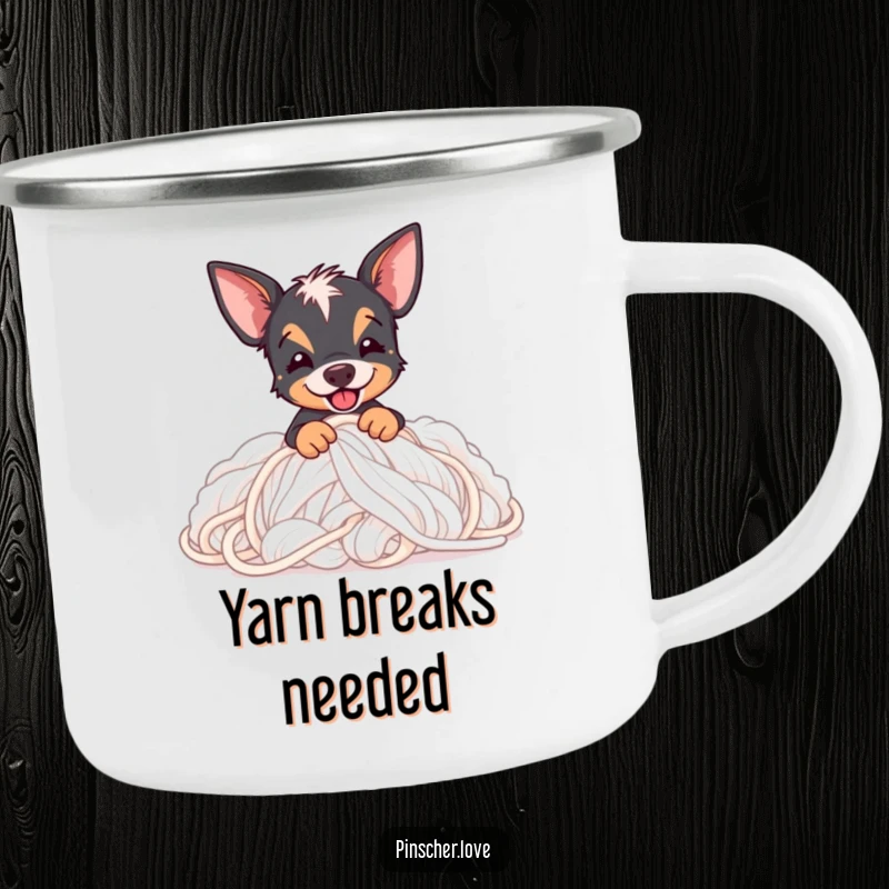 Funny Pinscher camping mug featuring a Pinscher dog happily digging into a huge pile of soft, fluffy yarn.