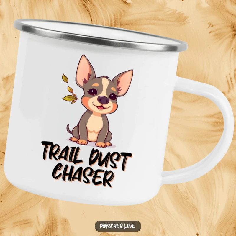 Funny Pinscher camping mug showing a cheerful Pinscher dog blowing a tiny, colorful autumn leaf, ideal for rugged adventures.