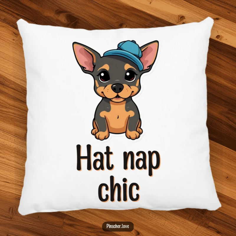 Funny decorative pillow with a proud Pinscher posing, wearing a tiny, jaunty cap tilted jauntily.