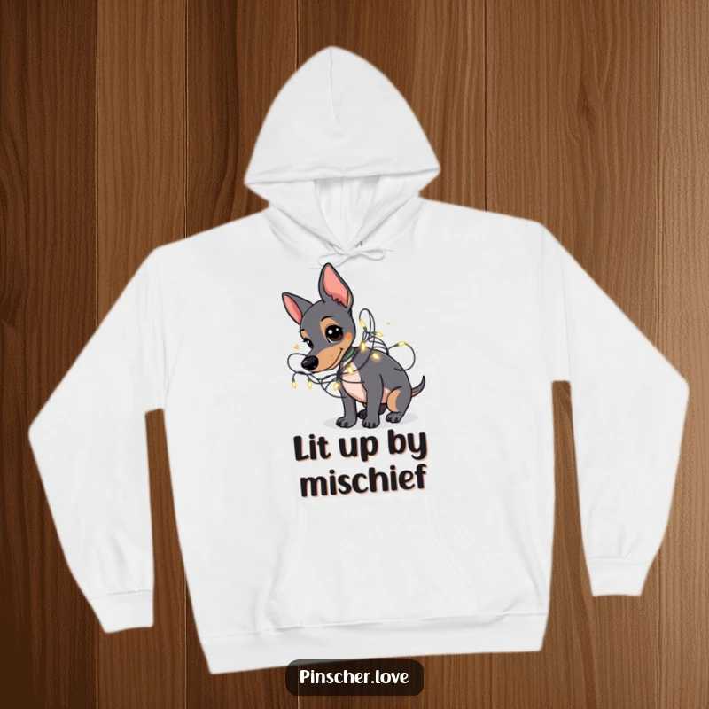 Funny Pinscher hoodie showing a Pinscher dog playfully tangled in a string of small, glowing fairy lights.