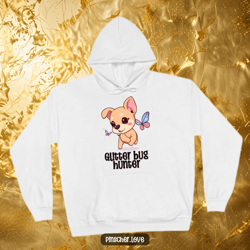 Funny Pinscher Hoodie: A cheerful pinscher dog with sparkling eyes chases a butterfly made of pure, shimmering magical dust.