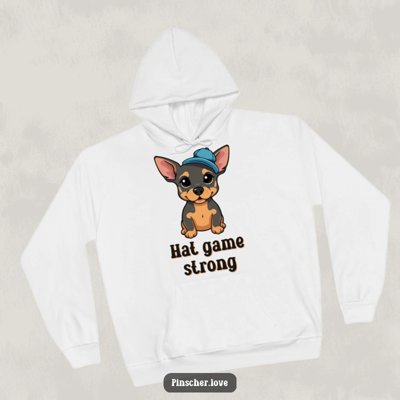 Funny dog hoodie with a proud Pinscher posing stylishly, wearing a tiny, jaunty cap tilted to the side.