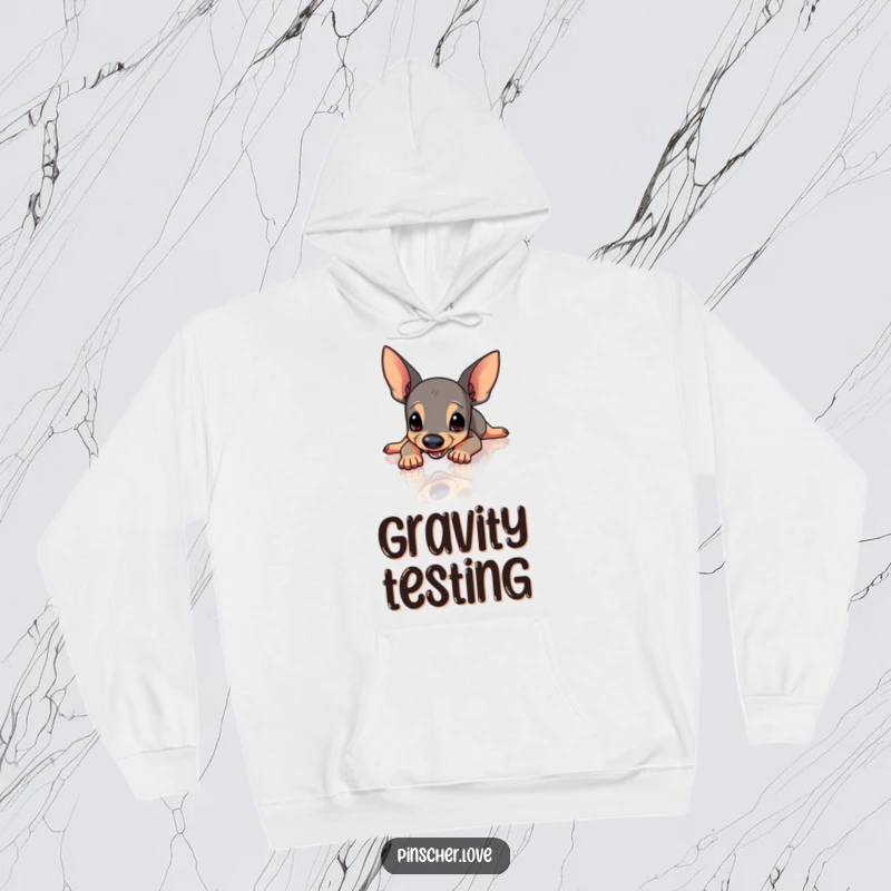 Funny Pinscher hoodie showing a Pinscher dog comically slipping and sliding uncontrollably on a highly polished, slick floor.