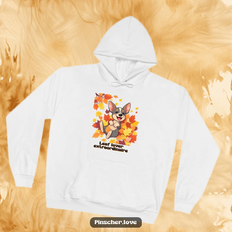 Funny Pinscher hoodie showcasing a happy Pinscher dog joyfully diving into a big pile of bright autumn leaves.