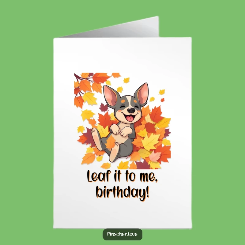 Free Printable Birthday Card: Funny Pinscher Rolling in Leaves, Downloadable Gift