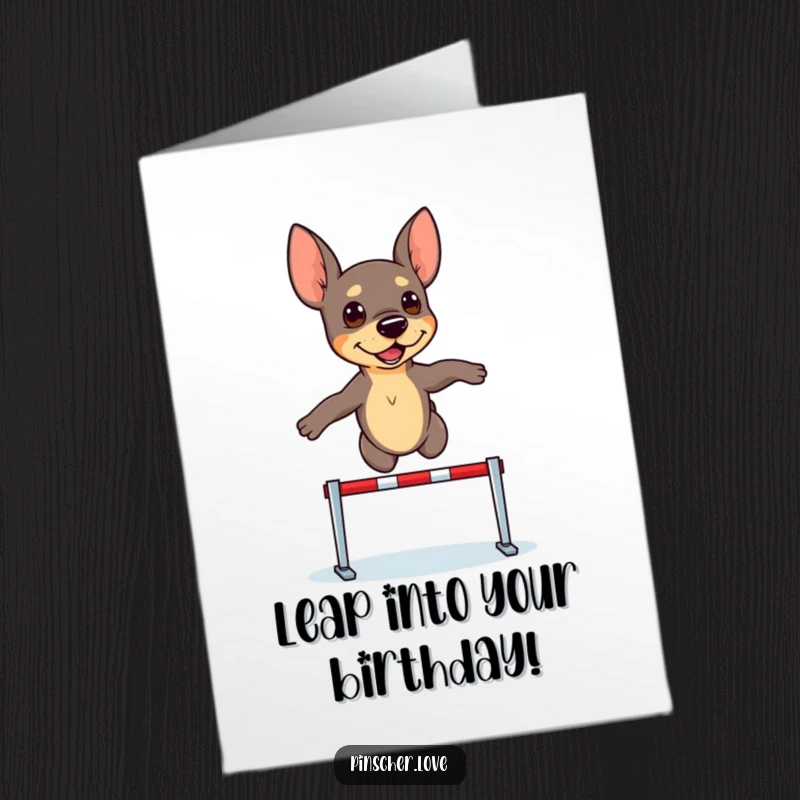 Funny Free Printable Birthday Card: A pinscher dog focusedly jumping over a small hurdle with determination.