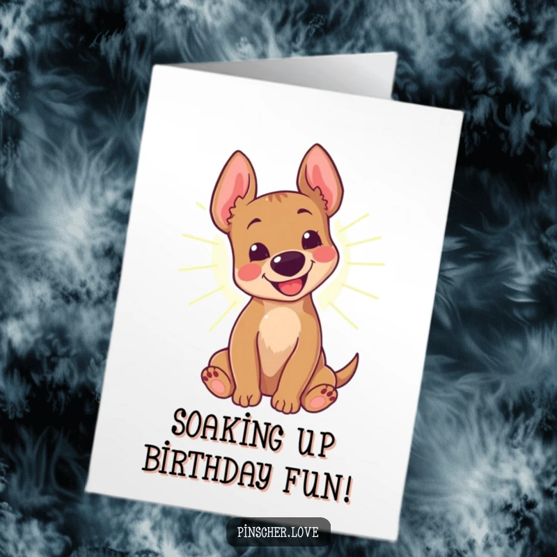 Funny Free Printable Birthday Card: A pinscher dog with a joyful bark happily rolling in a warm, bright sunbeam.