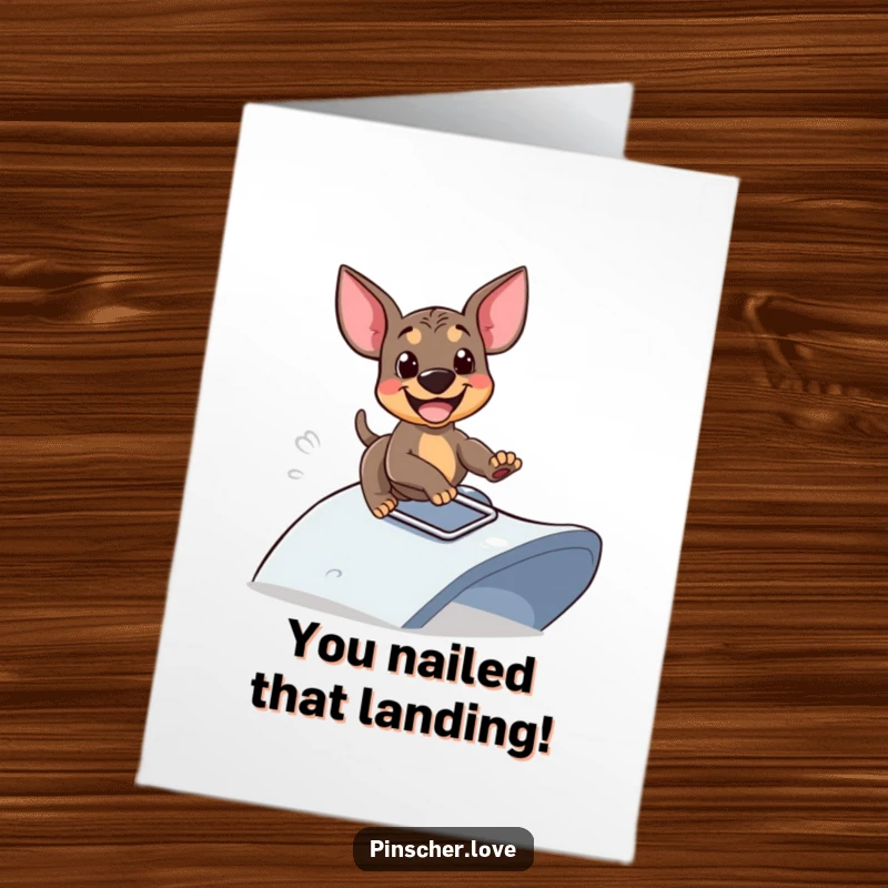 Funny Free Printable Congratulations Card showing a happy pinscher sliding down a playful ramp with pure glee and excitement.