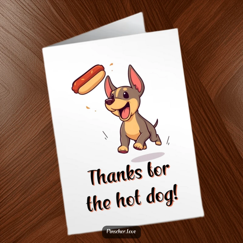 Funny Free Printable Thank You Card: Humorous Pinscher dog with eyes locked on a flying hotdog, ready to pounce.