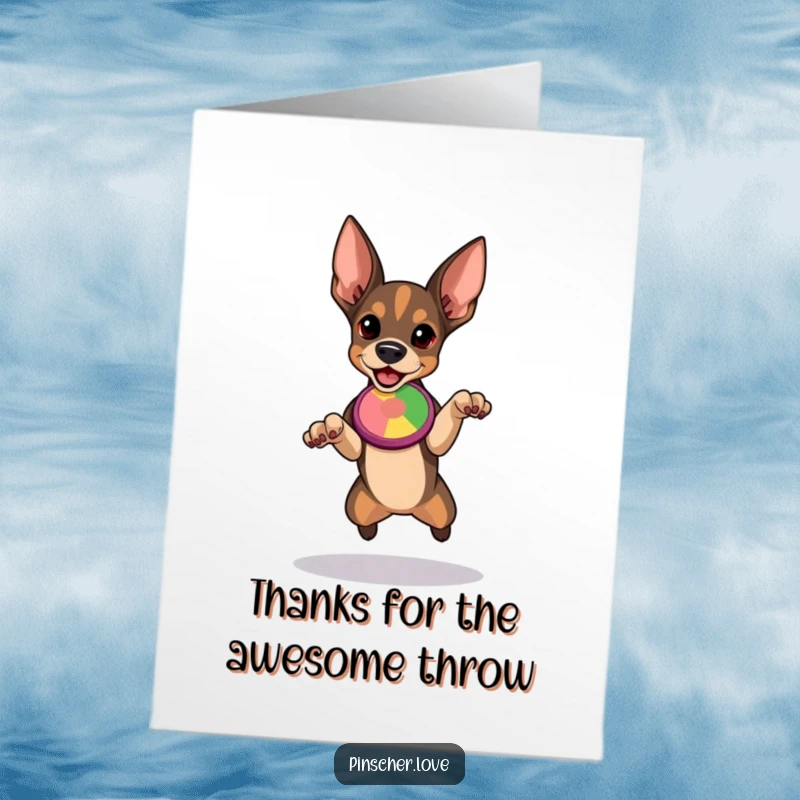 Free Printable Thank You Card, determined Pinscher dog ready to jump for a colorful flying disc, expressing thanks with gusto.