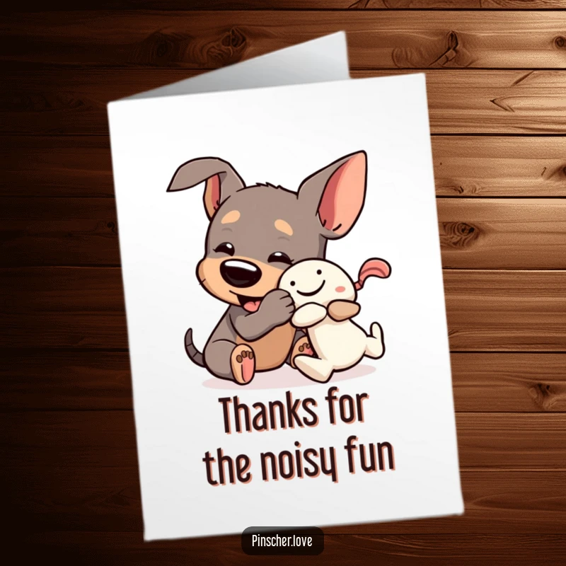 Funny Free Printable Thank You Card: Pinscher dog wrestling a squeaky toy, thanking you heartily.