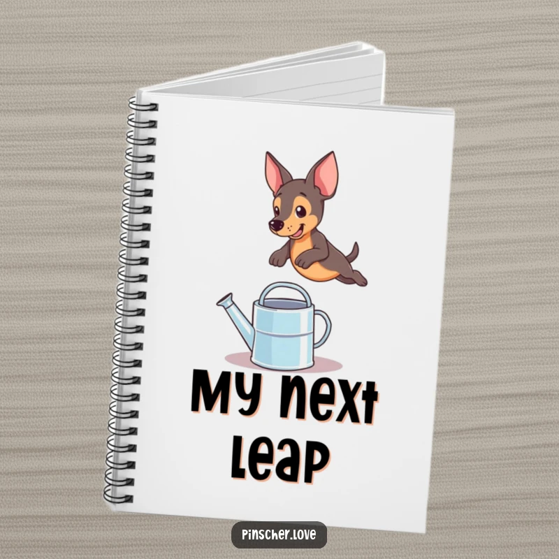 Funny pinscher dog leaping over a watering can, captured on a notebook cover for humorous note-taking sessions