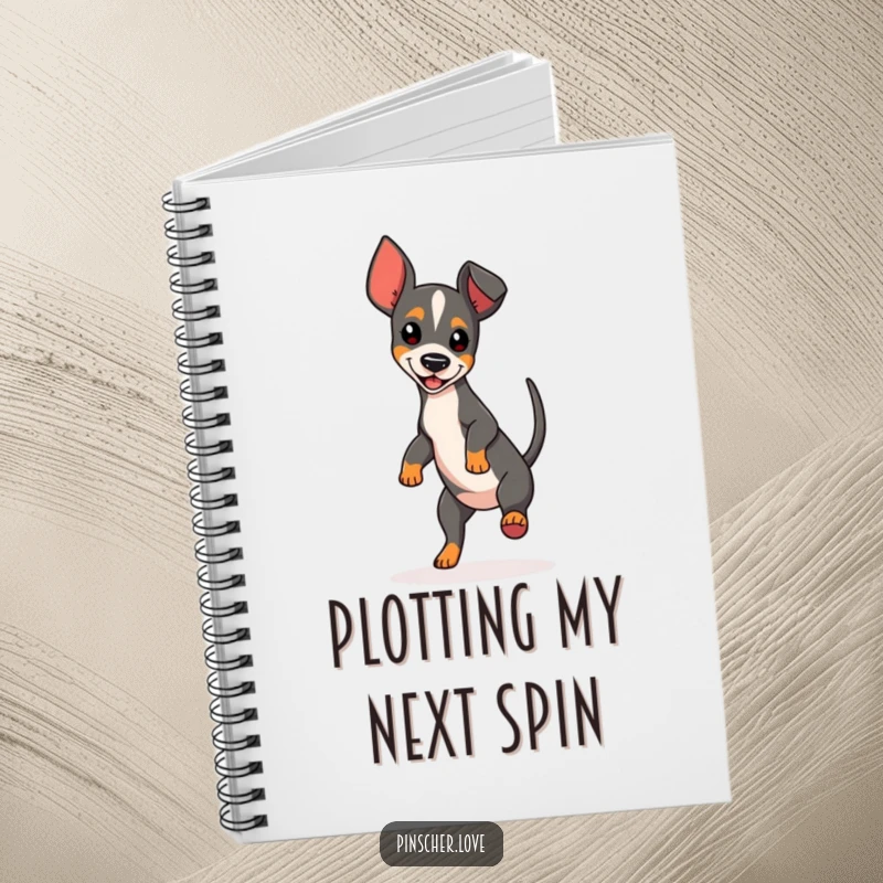 Funny Spinning Pinscher Notebook showcasing a dog in a continuous spin, ideal for capturing notes with a touch of humor.