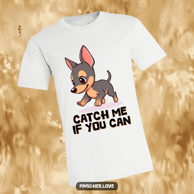Funny T-shirt of a Pinscher dog with perked ears, chasing its own tail in a funny loop, perfect for playful dog owners.