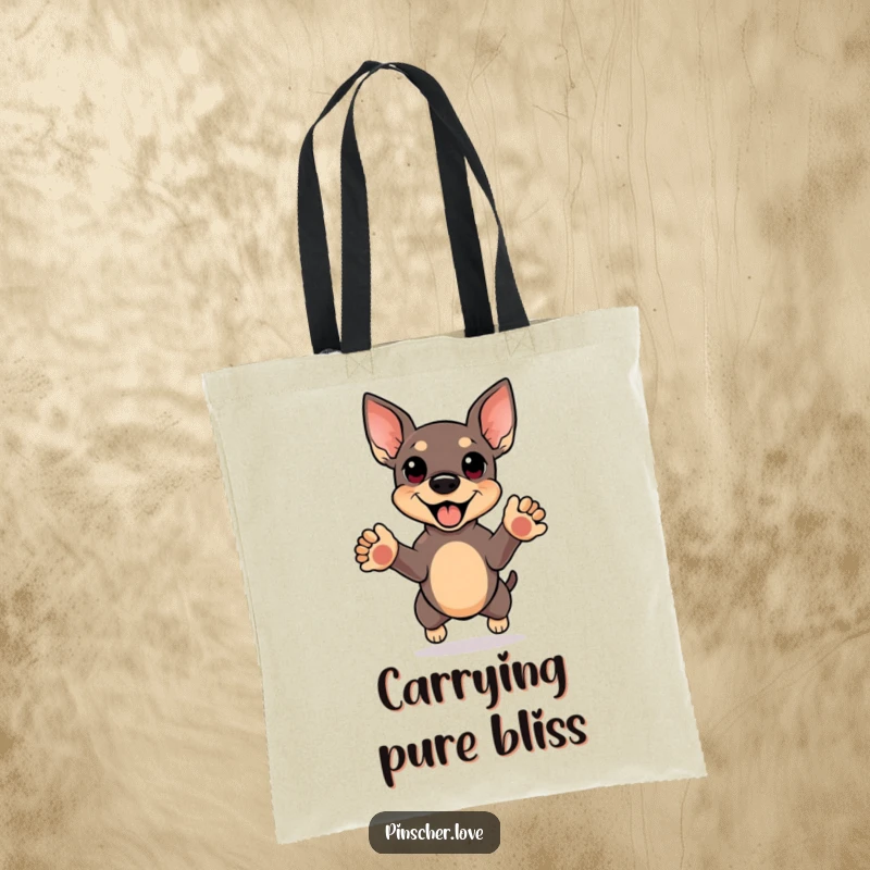 Funny tote bag showcasing a pinscher mid-jump, front paws reaching upwards in pure happiness, perfect for carrying cheerful essentials.